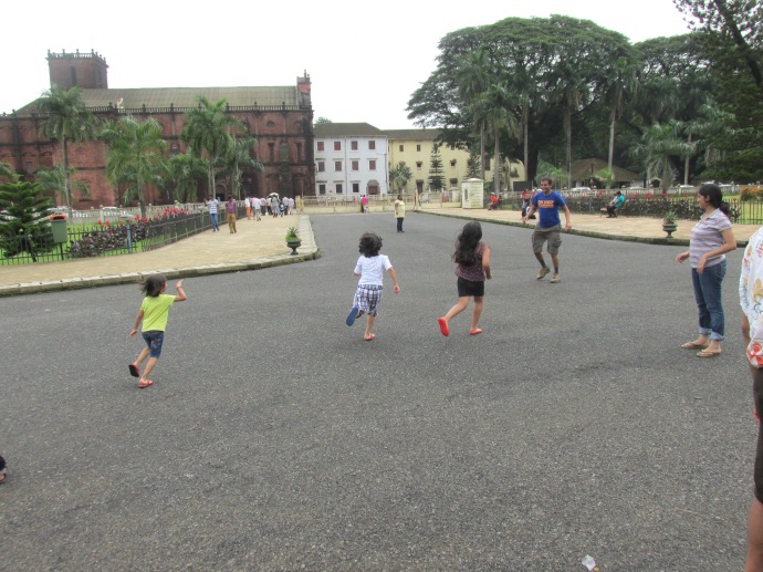 Kids playing in front of the church
